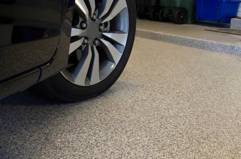A before and after showcase of garage epoxy flooring by Expert Epoxy Solutions in Leland, NC, highlighting the glossy finish and clean appearance.