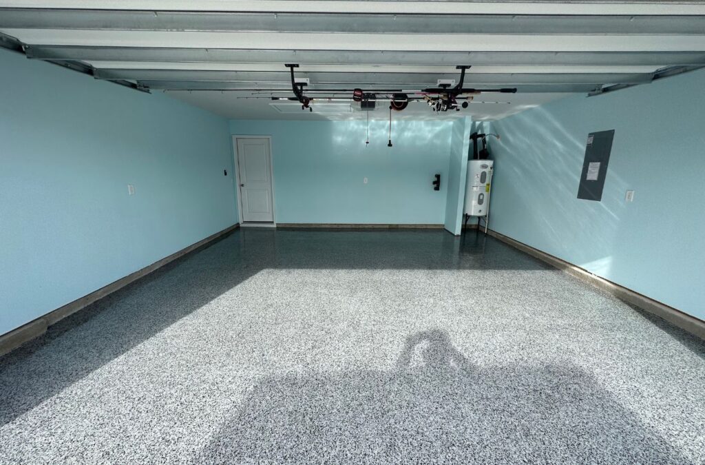 Professional epoxy garage flooring installation by Expert Epoxy Solutions in Castle Hayne, NC, highlighting the benefits of durability and style.